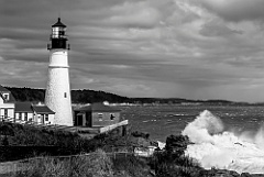 Sunlight Breaks Through Clouds on Portland Lighthouse - BW